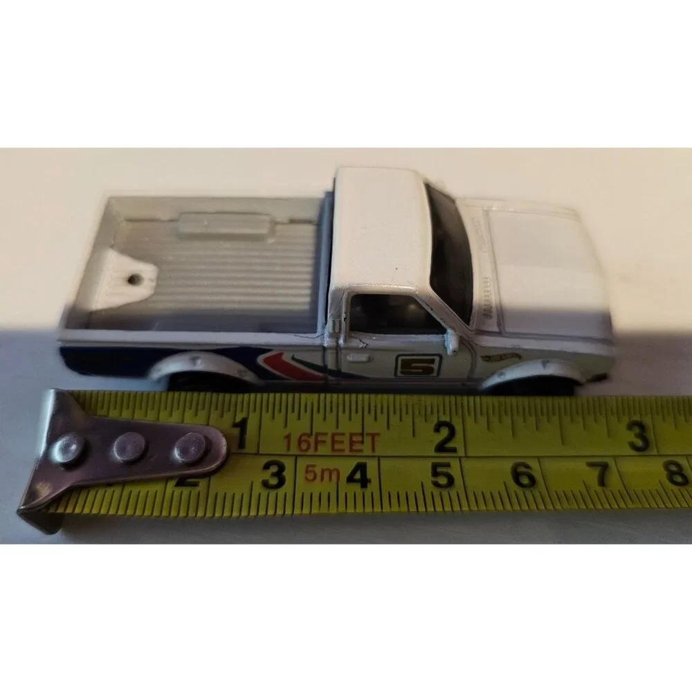 Hot Wheels Datsun 620 Die-Cast Pickup Truck Toy Model White Racing Stripes 2013